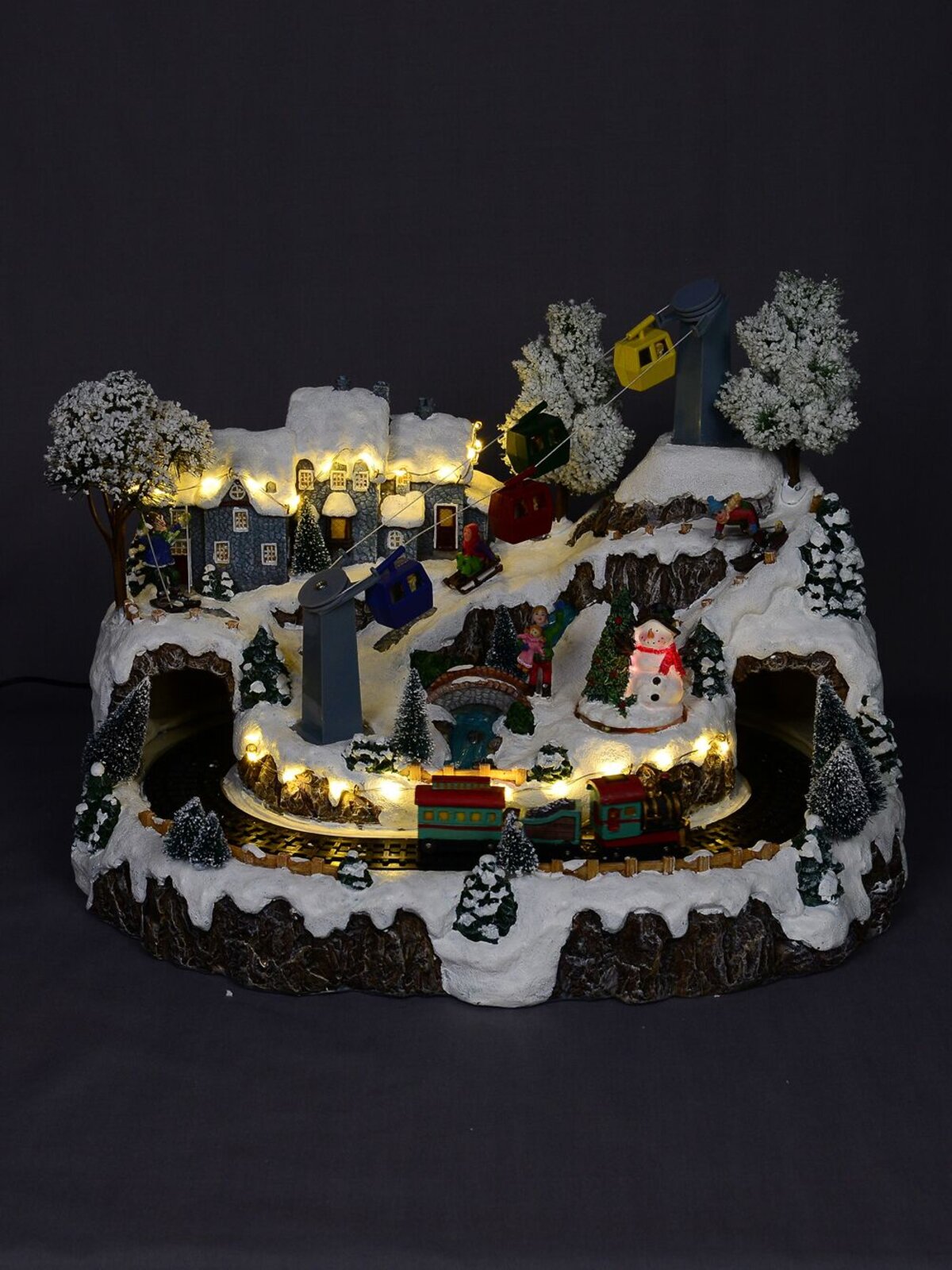 Animated & Illuminated Winter Snow Covered Village with Train & Cable Car - 38cm — image 2