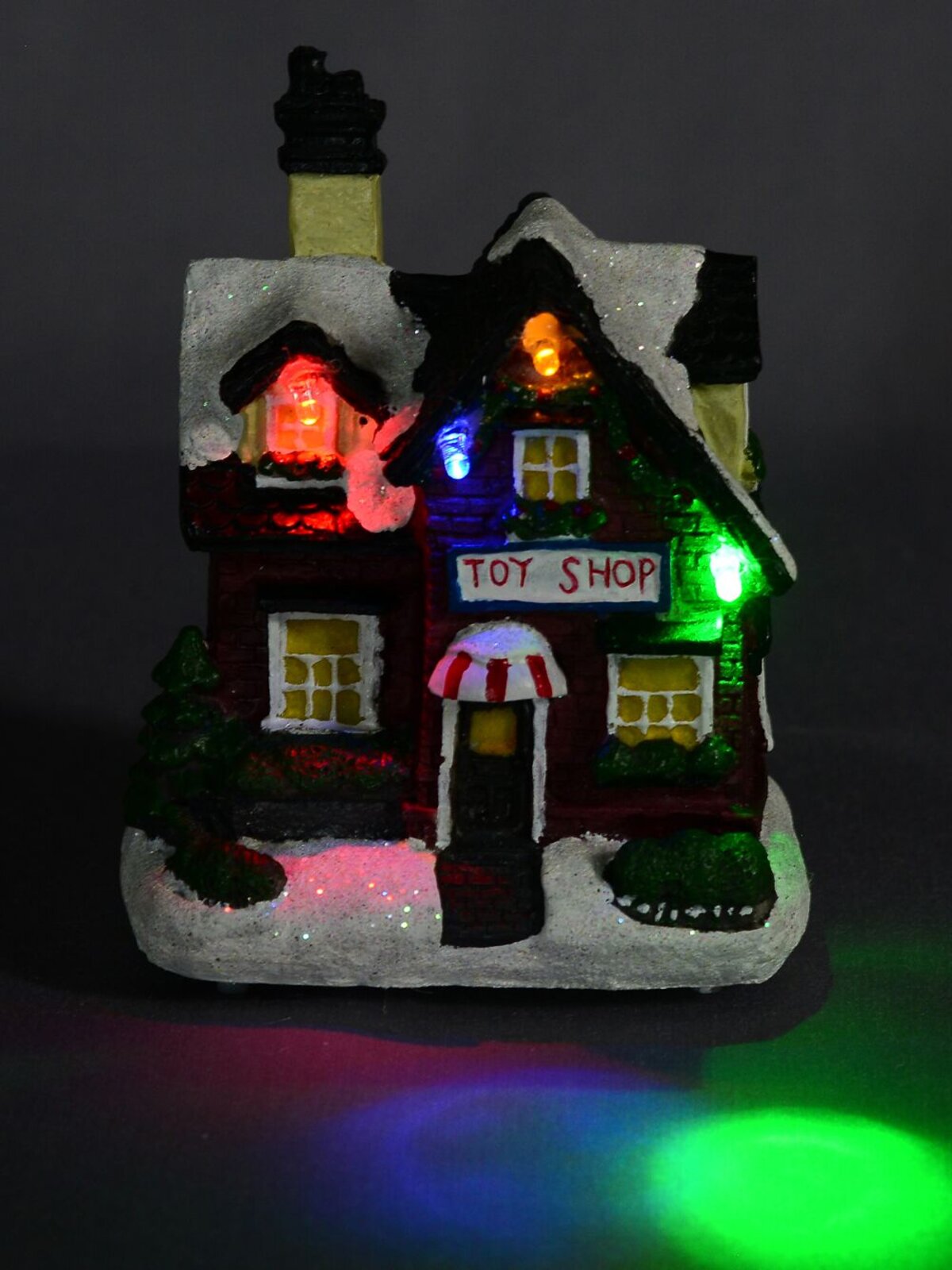 Illuminated Christmas Village Scene With Village Shops & Figurines - 11 Piece — image 4