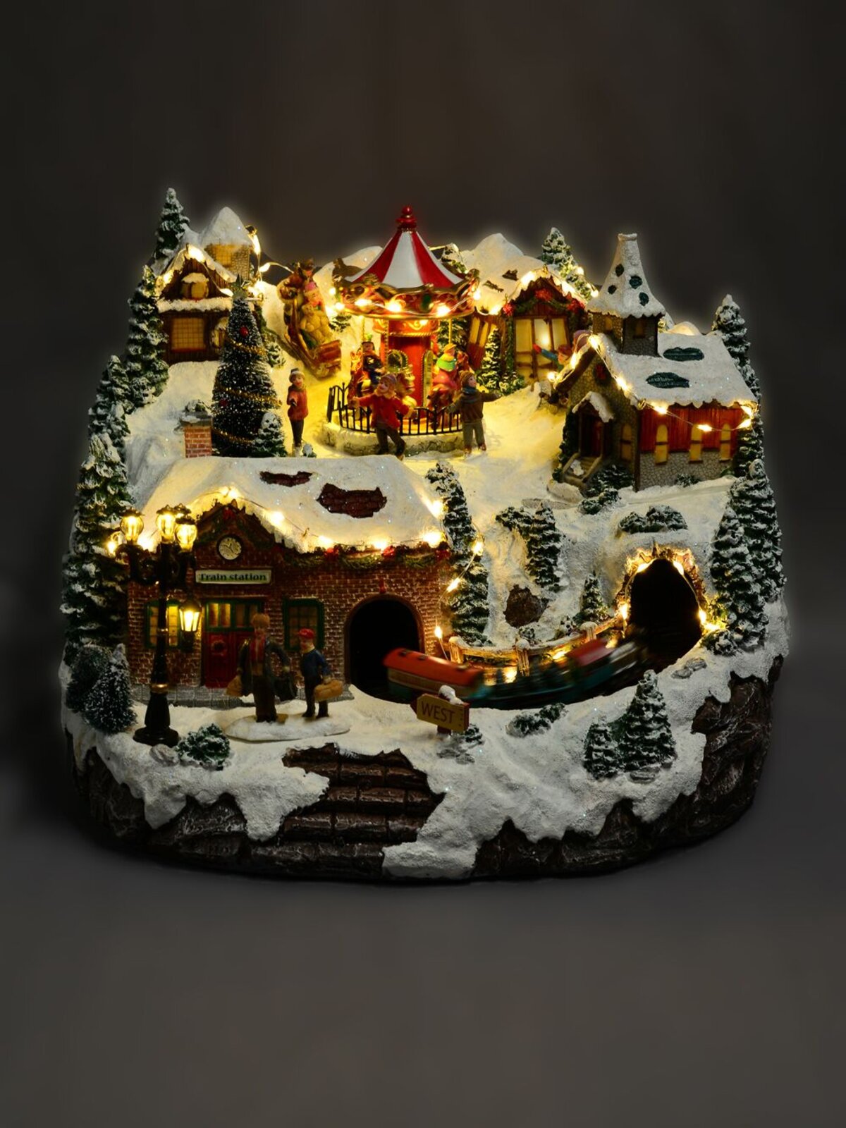 Northern Winter Christmas Village Scene With Rotating Train & Carousel - 26cm — image 3