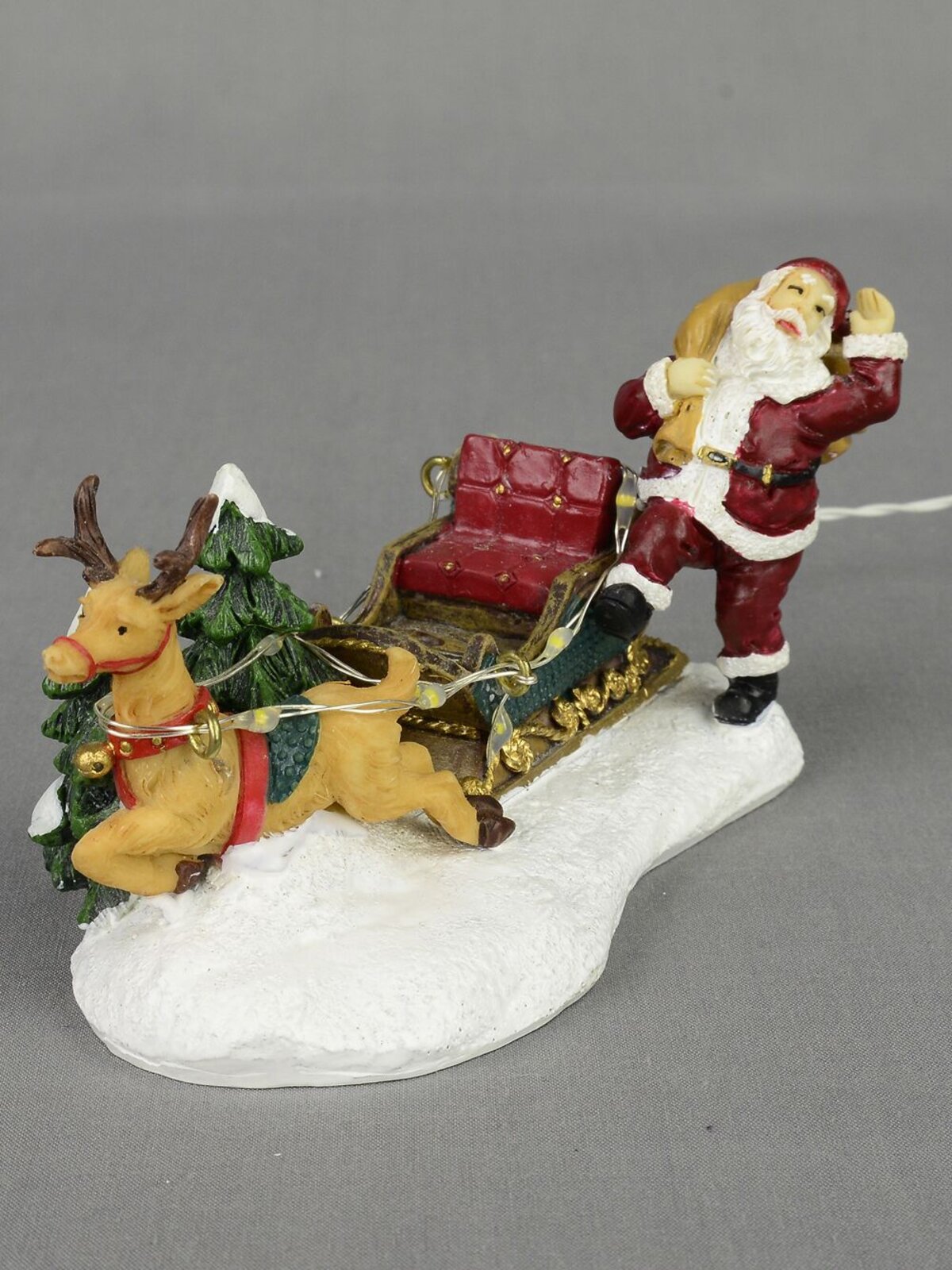 Santa, Sleigh & Reindeer With Illuminated Reins Resin Figurine - 12cm