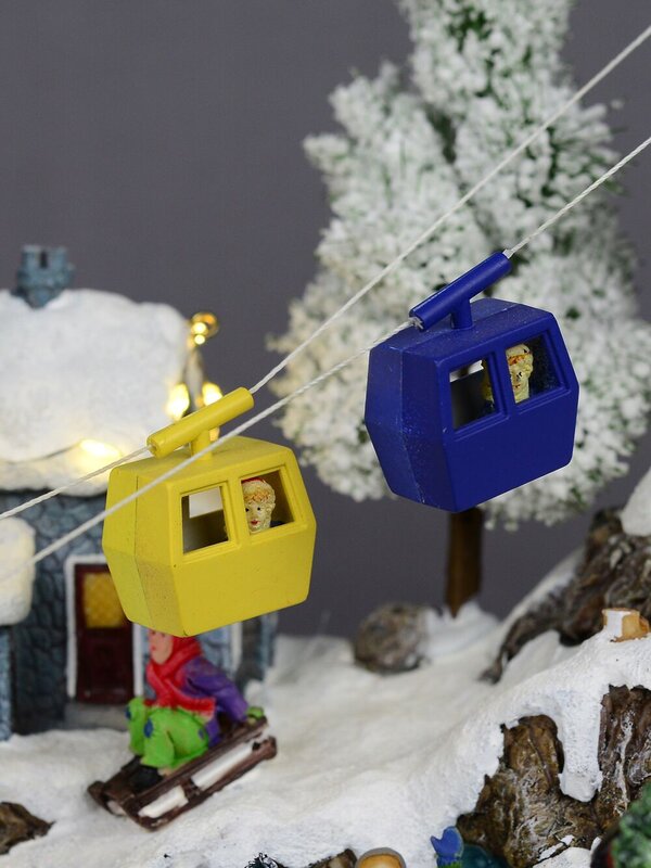 Animated & Illuminated Winter Snow Covered Village with Train & Cable Car - 38cm — image 6