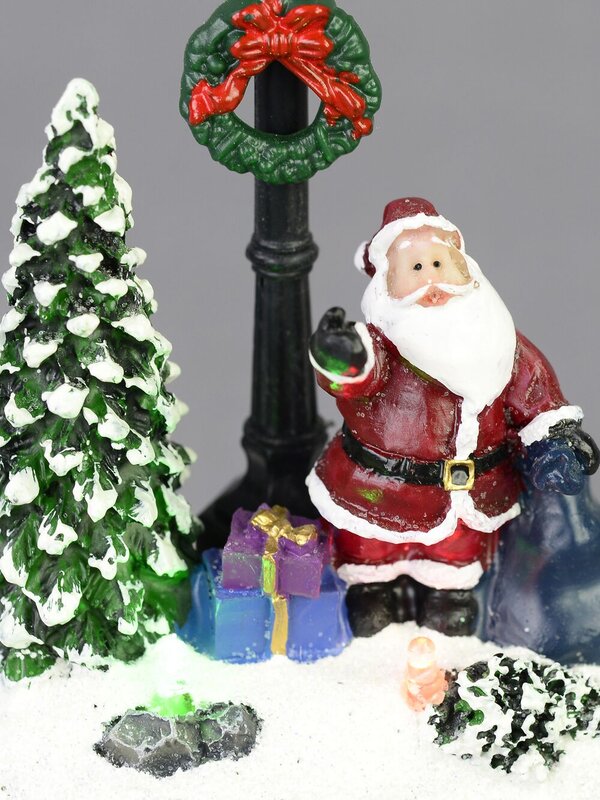 Illuminated Santa with Sack Under a Lamp Post Scene - 12cm