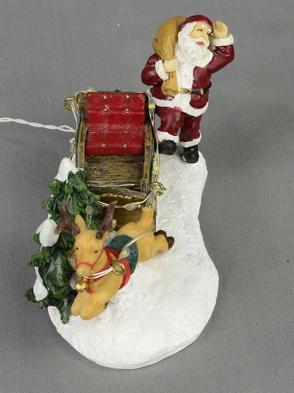 Santa, Sleigh & Reindeer With Illuminated Reins Resin Figurine - 12cm